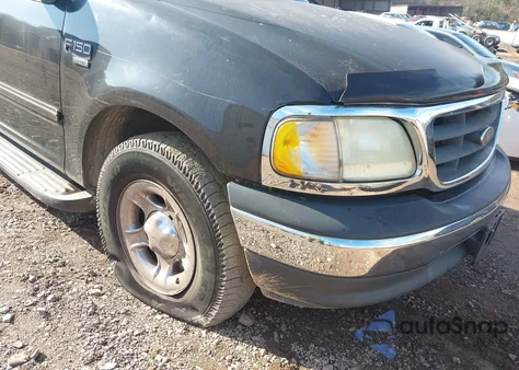 2003 Ford F-150 Lariat/Xlt z USA, uszkodzony, nr VIN 1FTRW07673KB30687